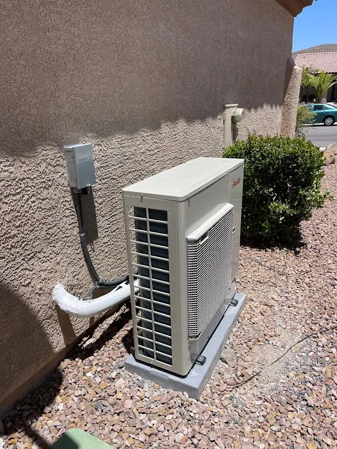 Residential air conditioning condenser unit in Marshall